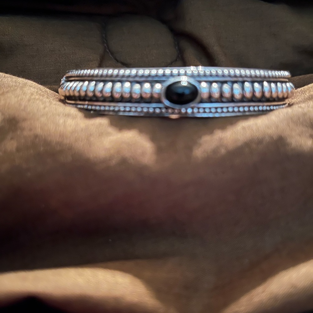 Silver bracelet with black stone